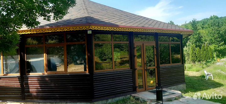 Беседка с мангалом у подножия мистической горы