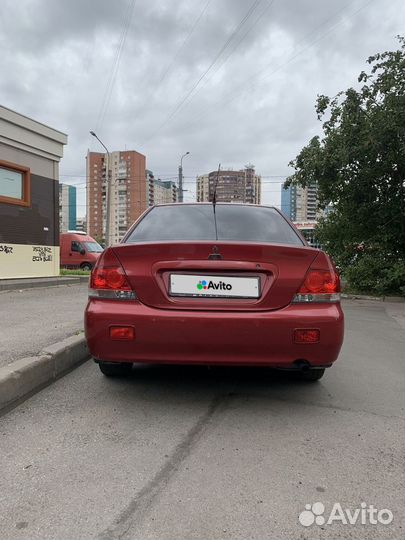 Mitsubishi Lancer 1.3 МТ, 2006, битый, 254 000 км