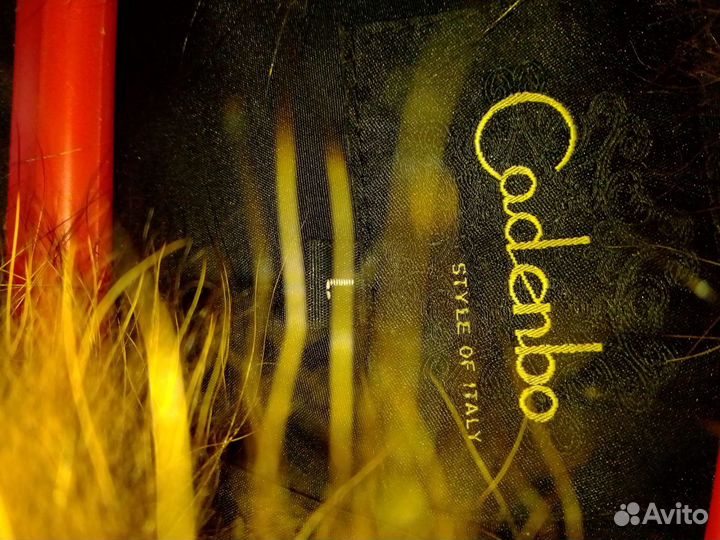 Жилетка кожаная с мехом