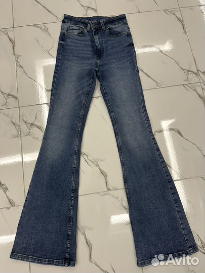 Джинсы клеш