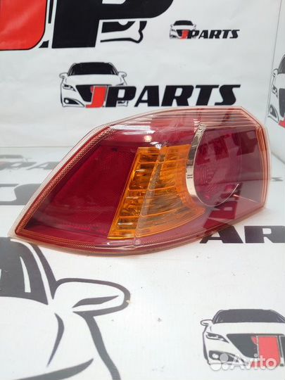 Фонарь задний наружный Mitsubishi Lancer 10