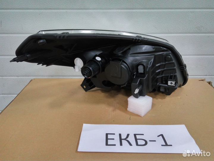 Фара левая Renault Sandero 1 2009-2014