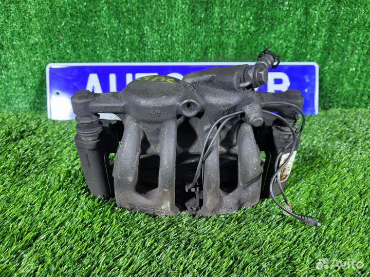 Суппорт тормозной передний левый Citroen C4