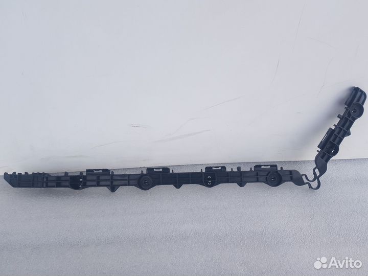 Кронштейн (крепление) бампера заднего L Toyota Cam