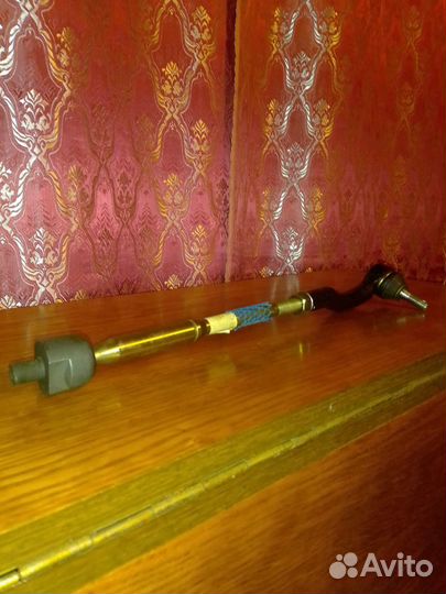 Рулевая тяга с рулевым наконечником левый