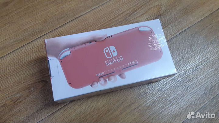 Продам Nintendo Switch coral новый