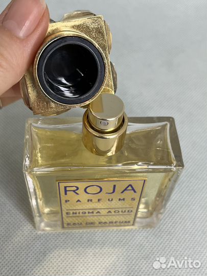 Roja enigma aoud woman Распив