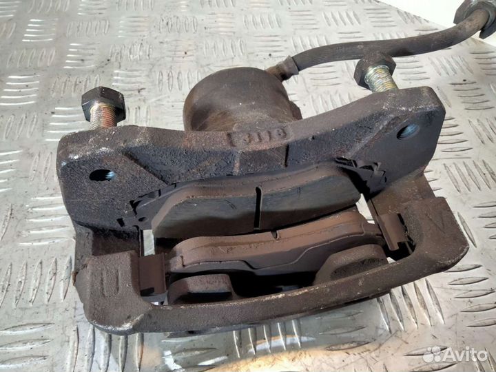 Суппорт передний Шевроле Лачетти