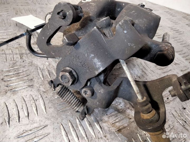 Суппорт задний левый Peugeot Partner