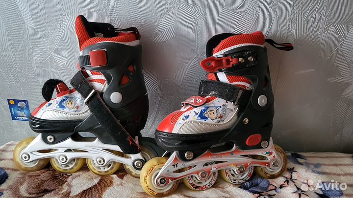 Роликовые коньки