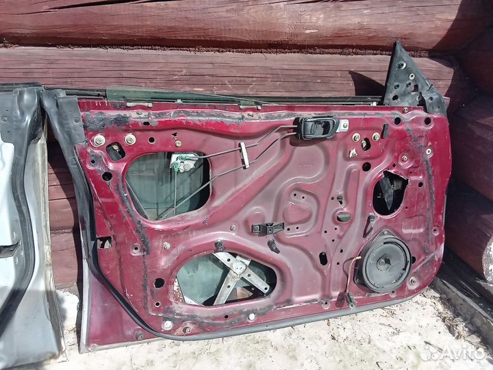 Двери Subaru Legacy