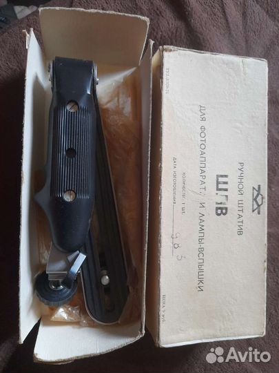 Вспышка камеры с ручным штативом