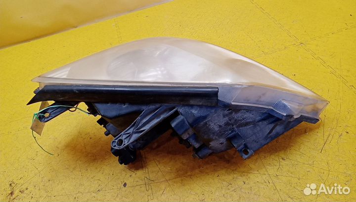 Фара левая MK