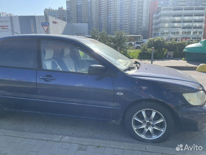 Mitsubishi Lancer 2.0 AT, 2003, битый, 210 000 км