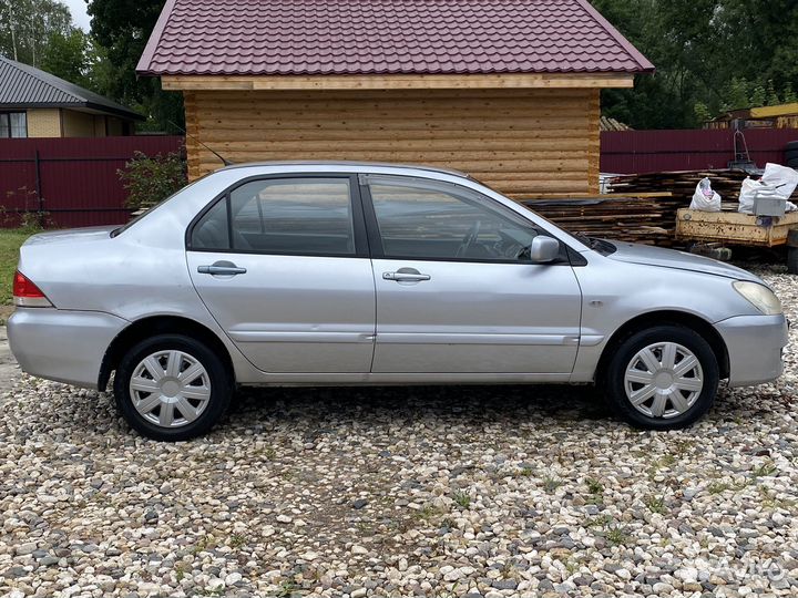 Mitsubishi Lancer 1.6 МТ, 2005, 331 000 км