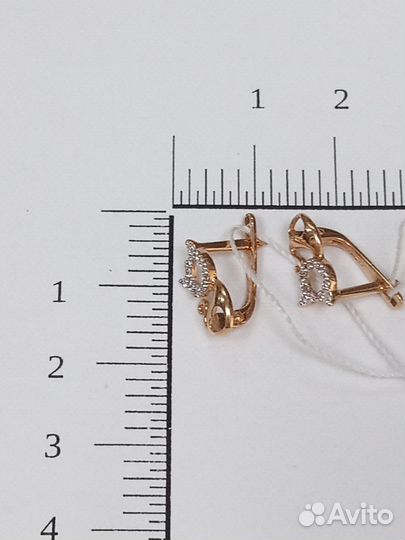 Золотые серьги с камнем