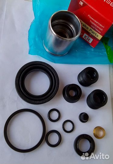 Ремкомплект заднего суппорта Ауди 100 80 с поршнем