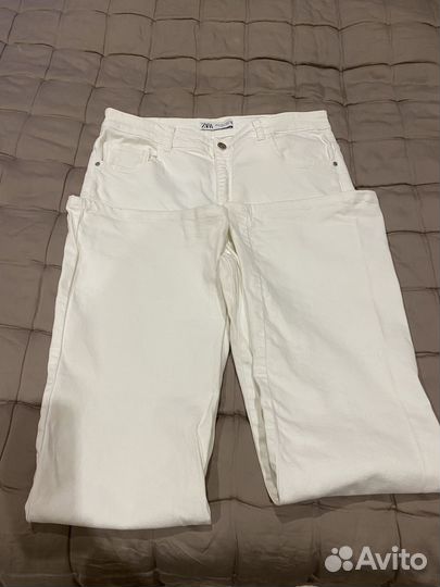 Джинсы zara с разрезами 34