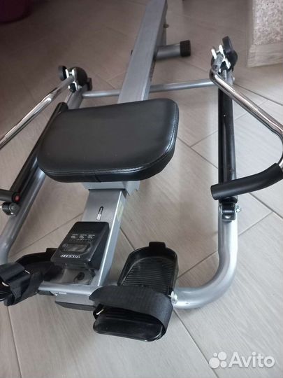 Гребной тренажер