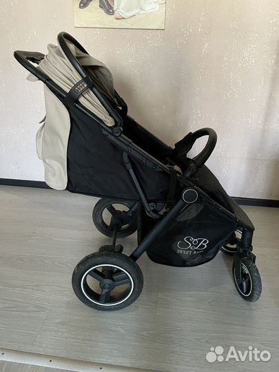 Всесезонная прогулочная коляска