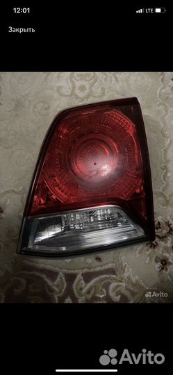 На Тойота 200 ку фара задняя правая в дверь