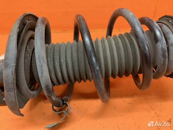 Стойка амортизатора передняя левая Chevrolet