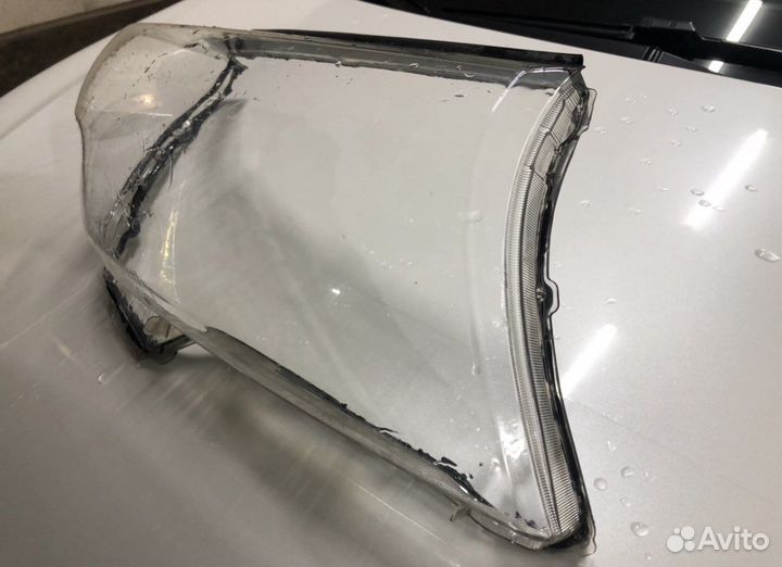 Стекло фары на Тойота ленд крузер 200 2014 года с