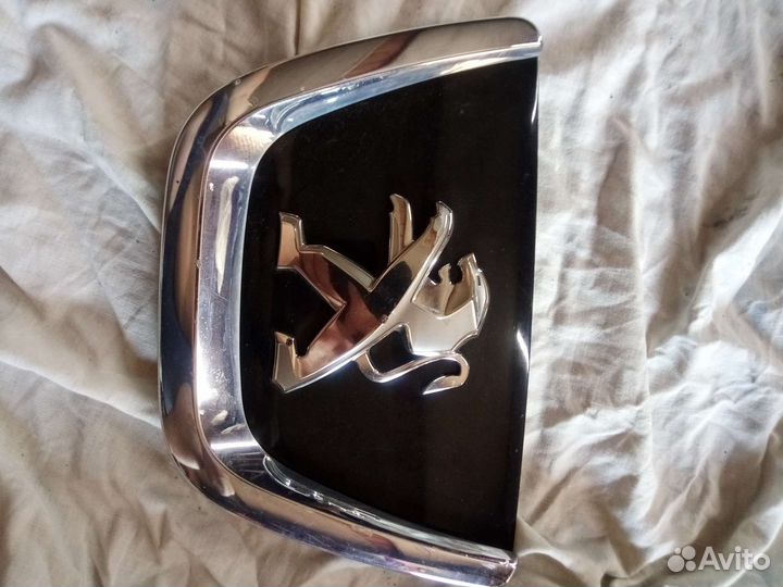 Логотип peugeot