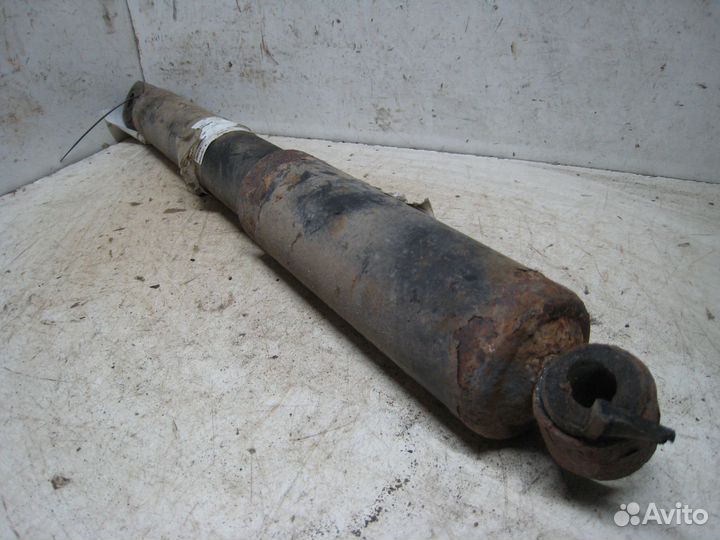 Амортизатор подвески задний Лев. Мицубиси