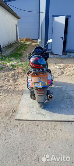 Макси скутер