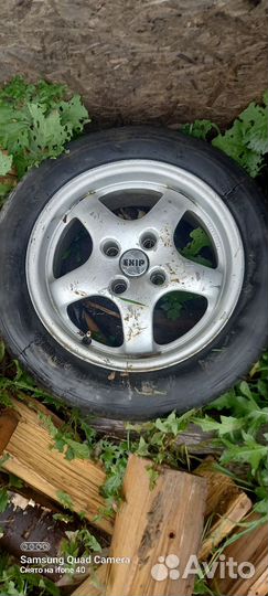 4 колеса r- 14 летние и 4 диска r-15