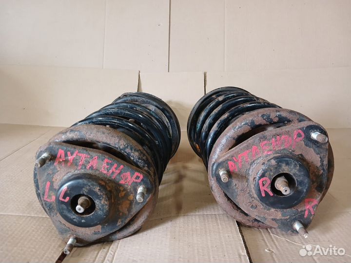 Передние стойки Mitsubishi Outlander 1