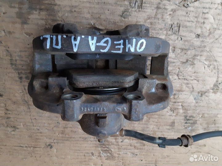 Суппорт передний Опель Омега А