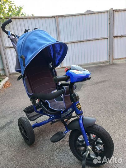 Трехколесный велосипед с ручкой
