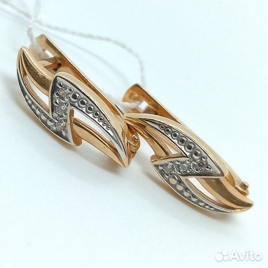 Золотые серьги с камнем