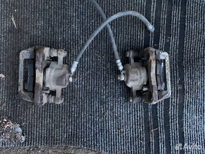 Kia sportage 2 суппорт задний