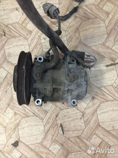 Компрессор кондиционера на toyota corolla AE110