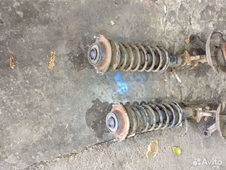 Передние стойки mazda 121