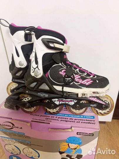 Роликовые коньки