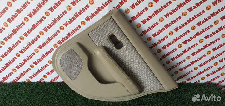 Обшивка боковой двери задняя правая Nissan Tiida