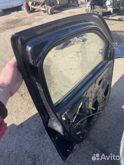Дверь передняя левая renault logan 1