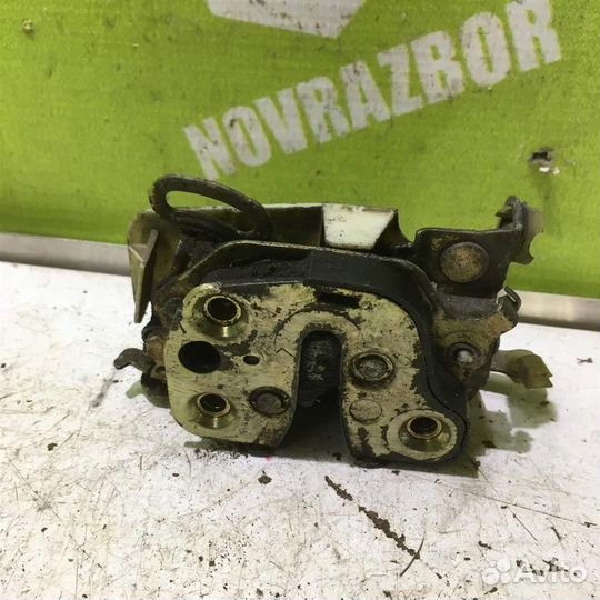 Замок двери передней левой Опель Вектра А