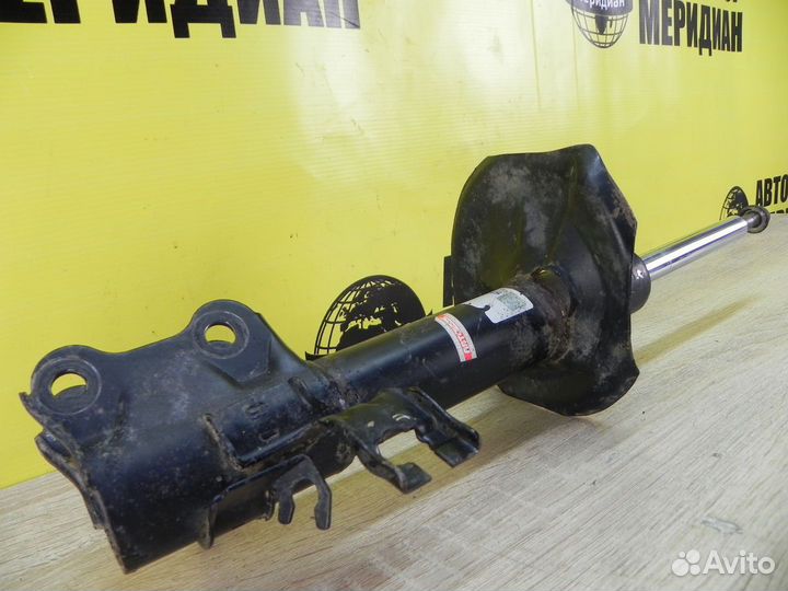 Nissan Almera N16 Амортизатор передний