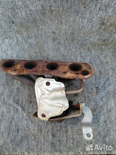 Выпускной коллектор Nissan Cube Z12 HR15