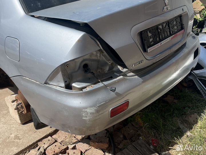 Задний бампер lancer 9