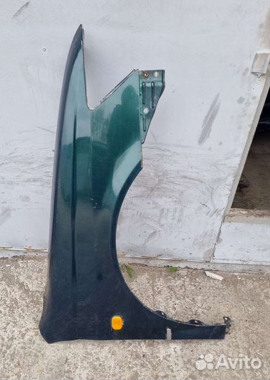 Крыло правое переднее Vista