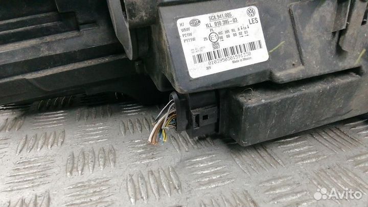 Фара левая Volkswagen Jetta