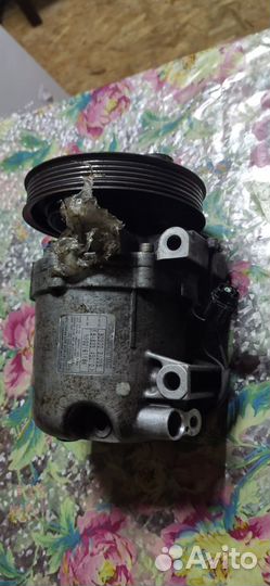 Компрессор кондиционера Lancer Cedia