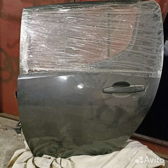 Дверь задняя левая митцубиси L 200