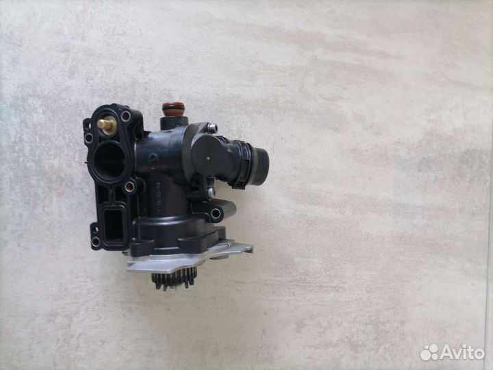 Помпа с термостатом в сборе VAG 06J121026F